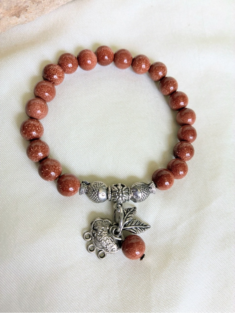 Goldstone beaded bracelet with silver tone charm #boho #festival
